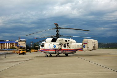 Fire and rescue helicopter Ka-32A Emergency Situations Ministry on the platform of the International Sochi airport clipart
