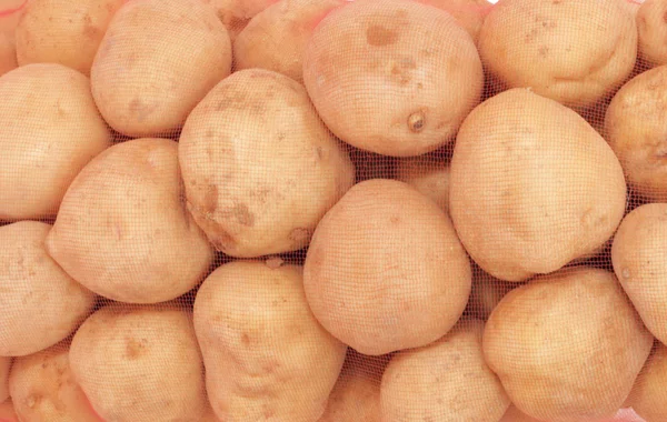 Saco isolado de batatas — Fotografia de Stock