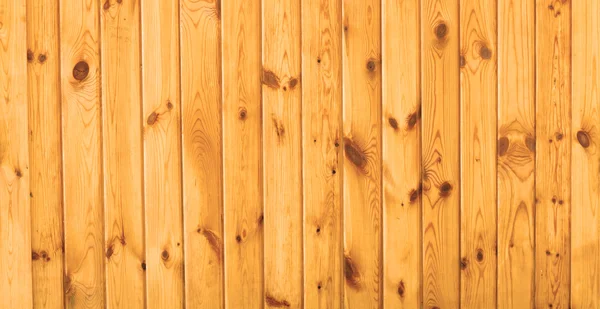 Piece of new wooden yellow fence — Stock Photo, Image