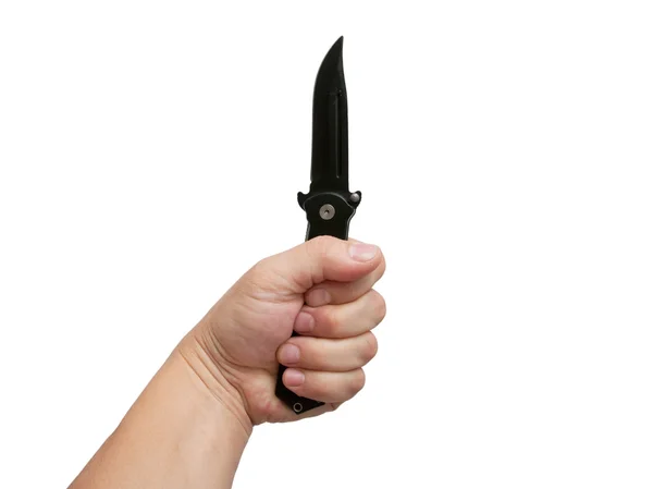 Нож в руке человека — стоковое фото