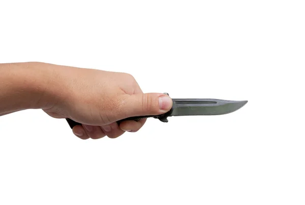 Svart kniv i handen på en vit bakgrund — Stockfoto