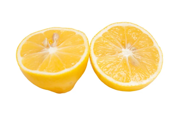 Metade de um limão com uma fatia isolada no fundo branco — Fotografia de Stock