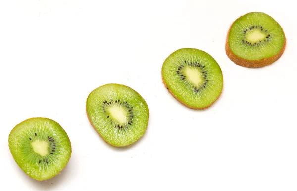 Sommige verse kiwi's op witte achtergrond — Stockfoto