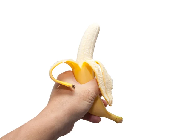 Ripe banana in the hand on white background — Stock Photo, Image