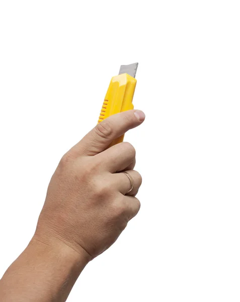 Isolerade hand som håller kniven skärverktyg — Stockfoto