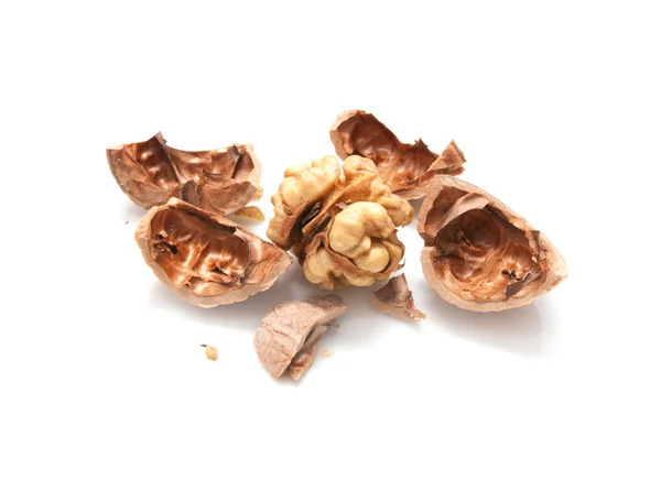 Crushed walnuts on white background — Stock Photo, Image