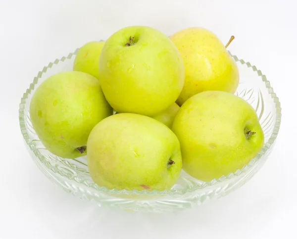 Groene appels in een glazen pot — Stockfoto