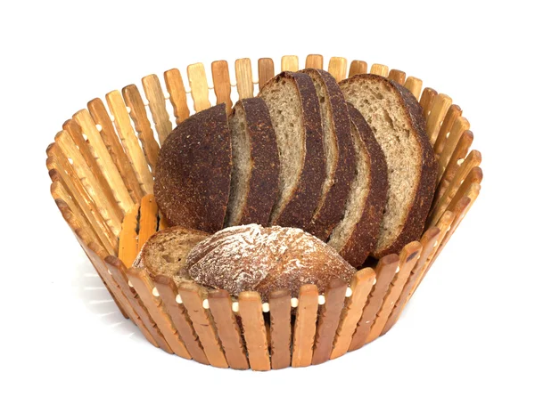 Black bread on board on white background — Stock Photo, Image