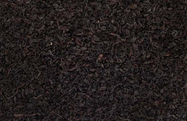 Black tea as a background — Stock Photo, Image