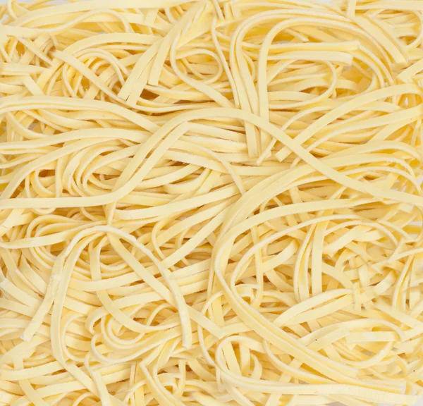 Sparso breve noodles sfondo — Foto Stock