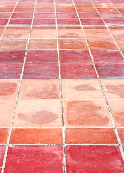 Perspectief van skyline rood tegels vloer — Stockfoto