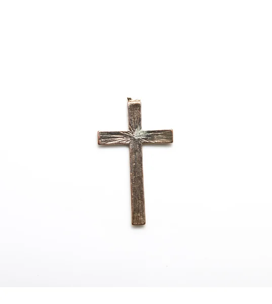 Cruz de bronze velho em um fundo branco — Fotografia de Stock