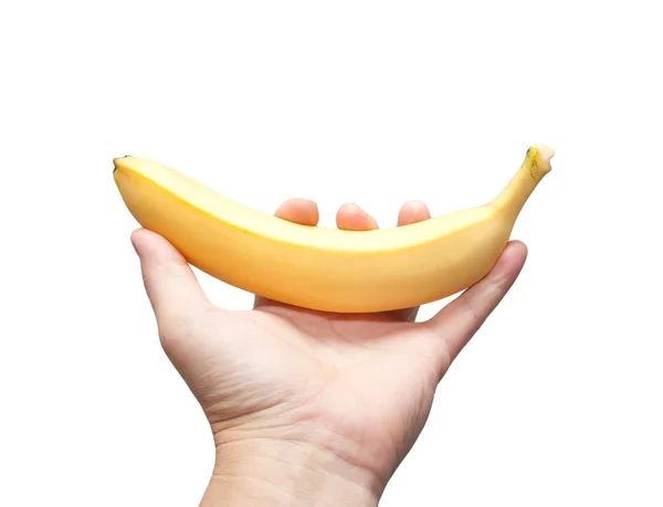 Banane mûre à la main sur fond blanc — Photo