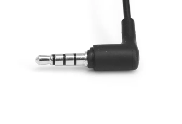 Mini Jack Plug com rolo de fio isolado em fundo branco — Fotografia de Stock
