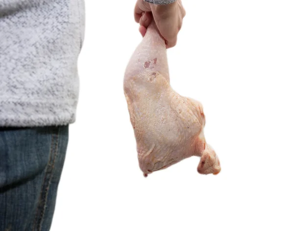 Pierna de pollo en la mano —  Fotos de Stock