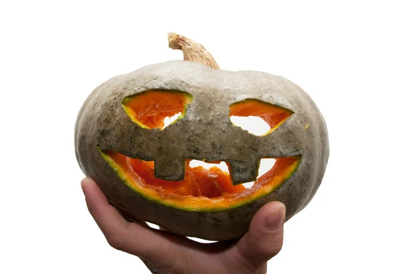 Hand holding halloween pumpkin — Stock Photo, Image