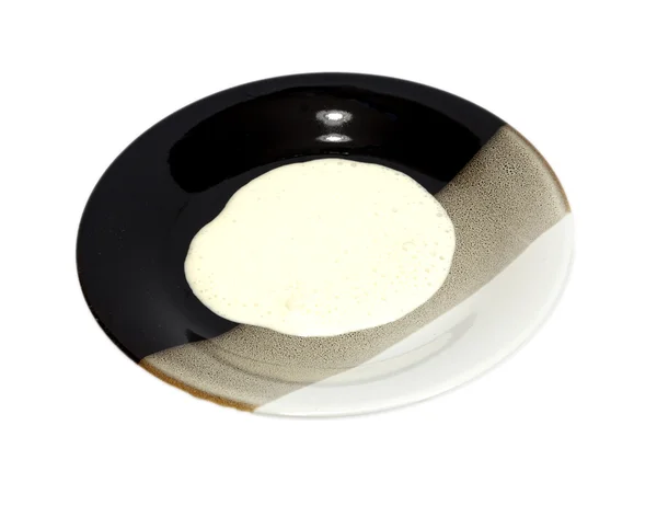 Crema agria en el plato — Foto de Stock