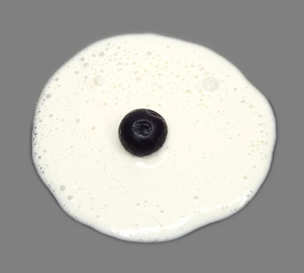 Cherry in yogurt — Stock Photo, Image
