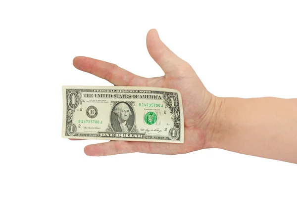 En mans hand håller en en dollarsedel. — Stockfoto