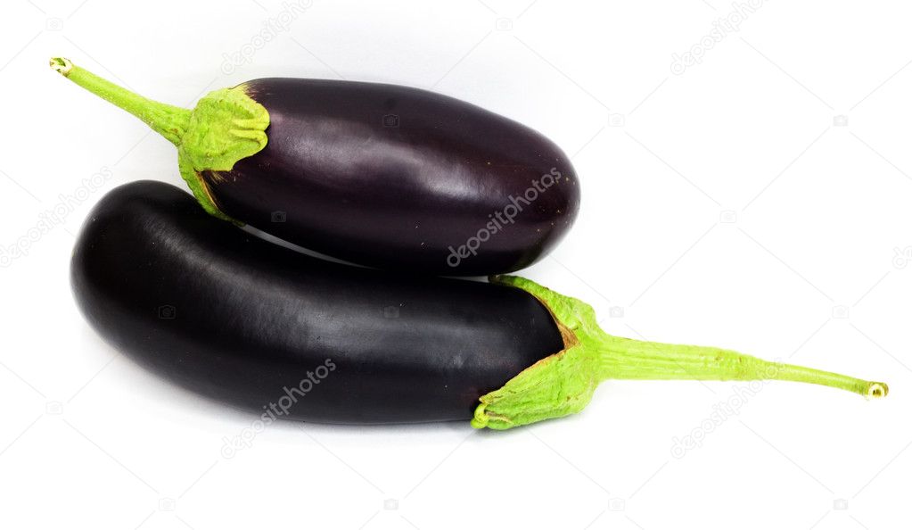 Two large eggplant, over white background.