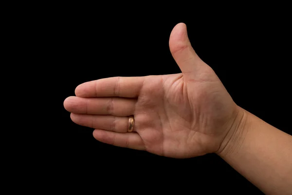 Hand on a black background — Stock Photo, Image