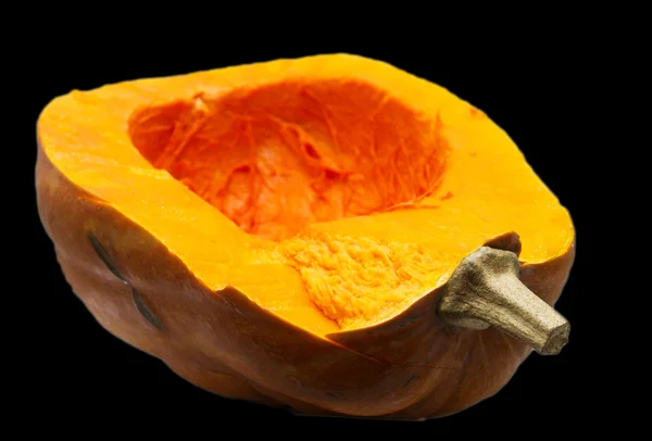 Cut the pumpkin on a black background — Stock Photo, Image