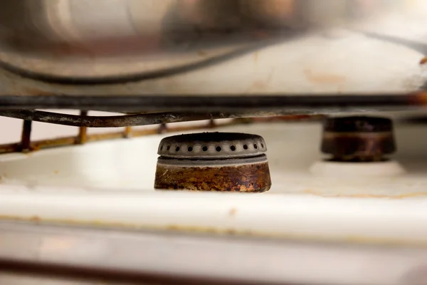 Queimador velho em um fogão a gás — Fotografia de Stock