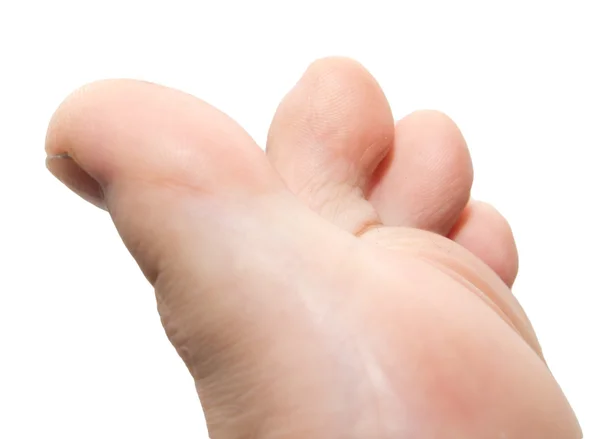 Dedos dos pés masculinos em um fundo branco — Fotografia de Stock