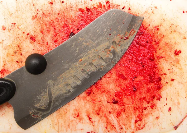 Blodiga bakgrund med en kniv — Stockfoto