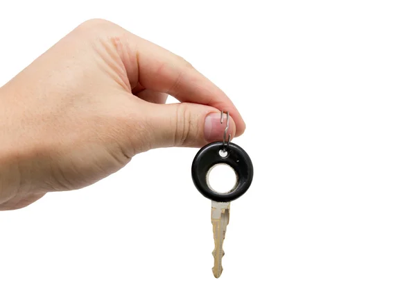 Schlüssel in der Hand auf weißem Hintergrund — Stockfoto