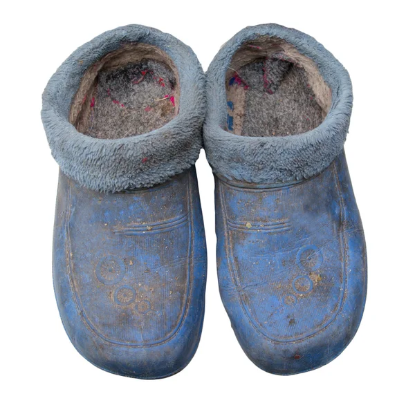 白い背景の上の汚れた雨靴 — ストック写真