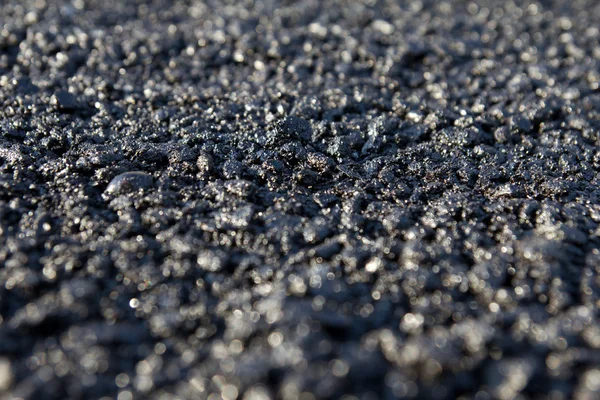 Novo asfalto colocado na estrada — Fotografia de Stock