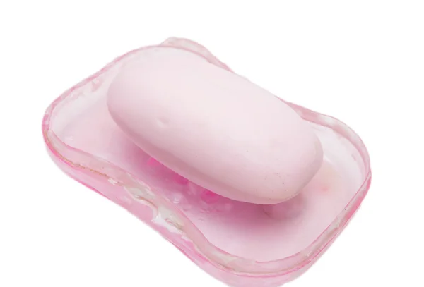 Růžové mýdlo na bílém pozadí — Stock fotografie