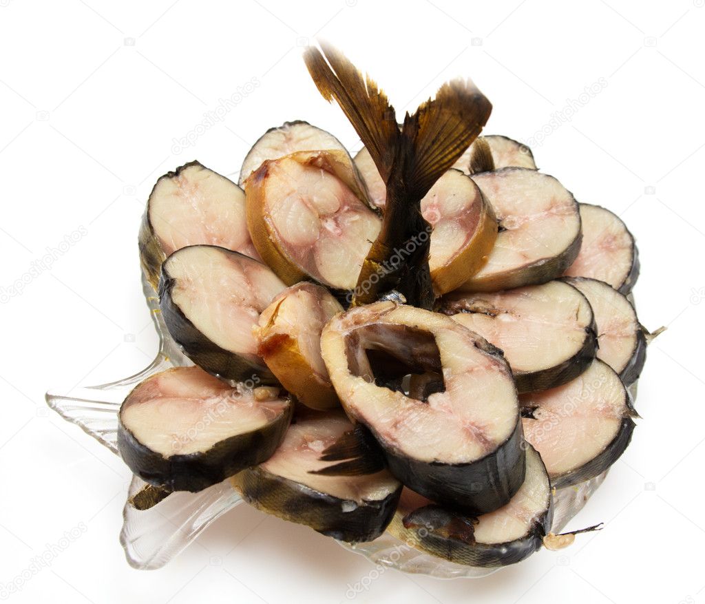 Smoked mackerel in a plate on a white background