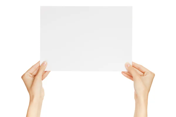 Händer som håller papper isolerad på vit — Stockfoto