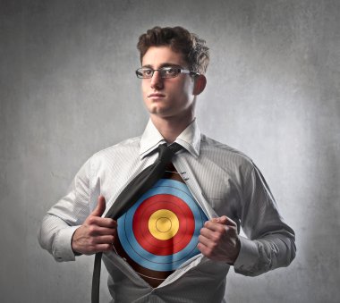 Young businessman showing a target under his shirt clipart