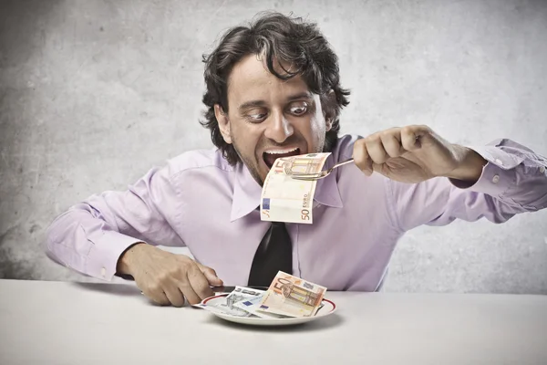 Eating the Earnings — Stock Photo, Image