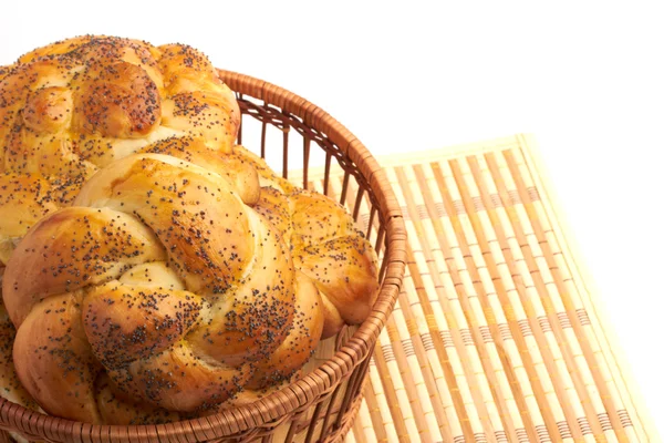 Bread in a basket on white — Stock Photo, Image