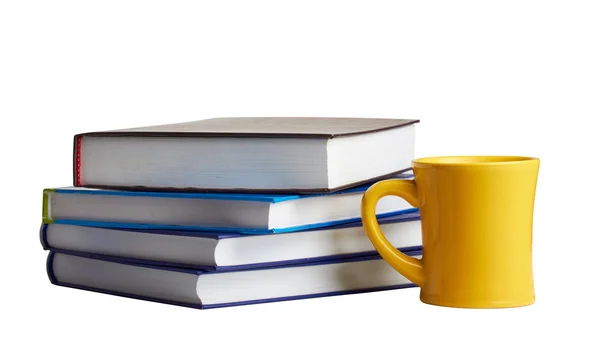 Kitaplar ve bir çay bardağı yığını — Stok fotoğraf