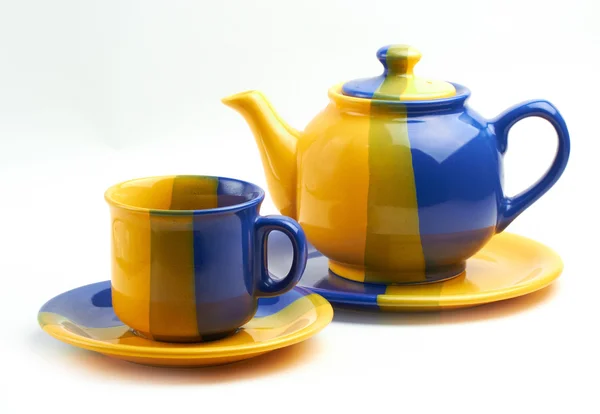 Teapot and cup on white — Foto de Stock