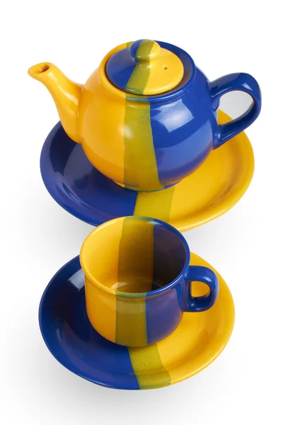 Teekanne und Tasse auf weiß — Stockfoto