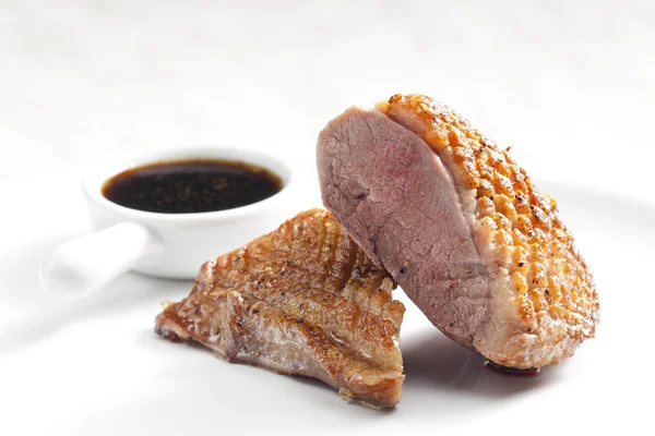 Fried duck breast with sauce of honey, balsamico and red wine — Stock Photo, Image