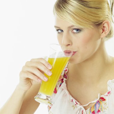 Woman with a glass of juice clipart