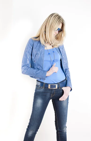 Portrait of standing woman wearing blue clothes — Stock Photo, Image