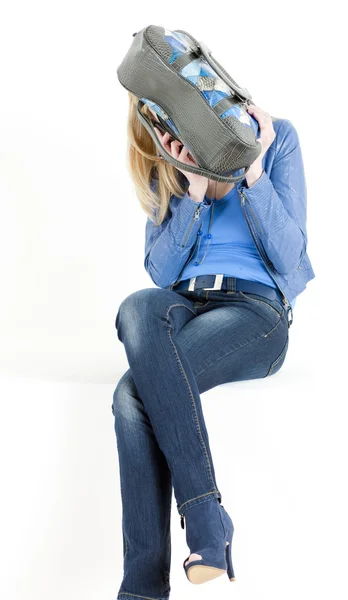 Sitting woman with handbag — Stock Photo, Image