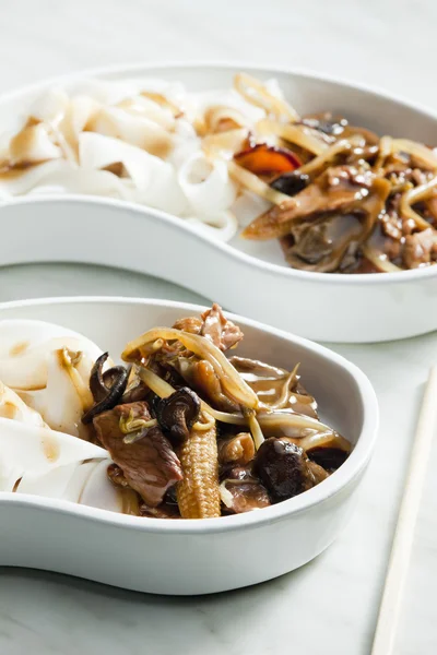 Poultry meat with corn and shitake mushrooms — Stock Photo, Image
