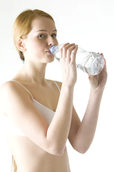 Portret kobiety z butelką wody — Zdjęcie stockowe
