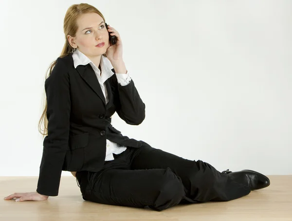 Telefonar a uma mulher de negócios — Fotografia de Stock