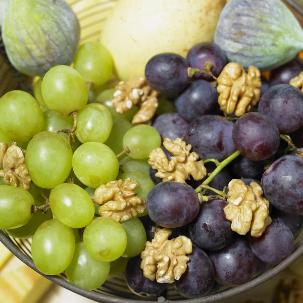 Fruit with walnuts — Stock Photo, Image