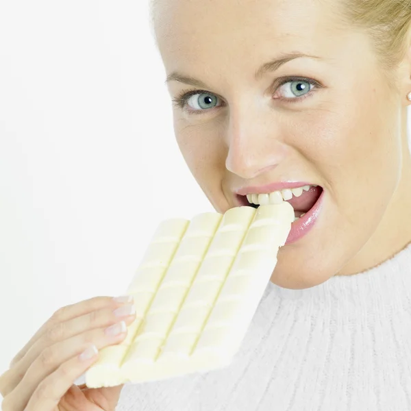Woman with white chocolate — Stock Photo, Image